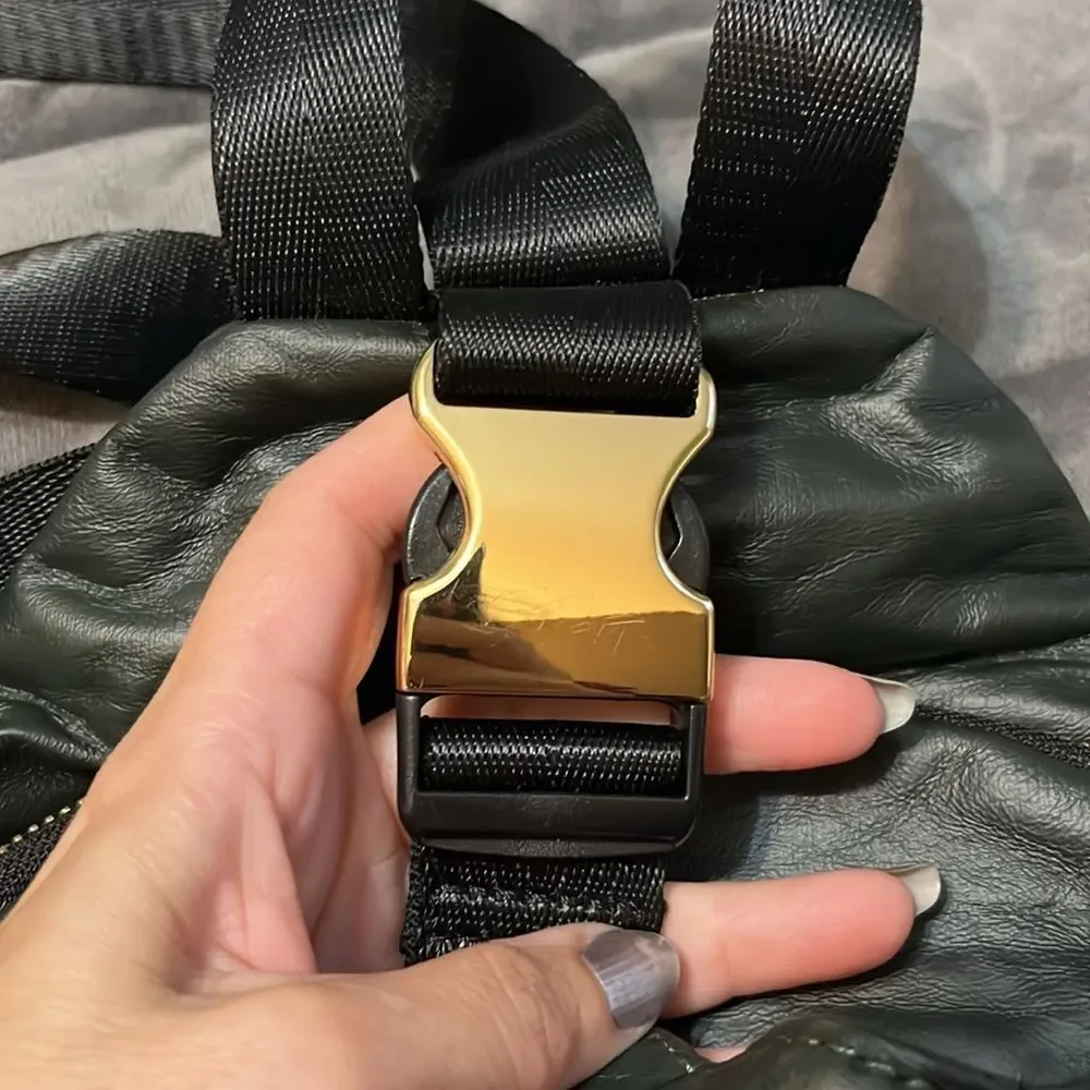 Sol and Solene on the Go Sling Backpack Dark Green with Gold Metal Accents